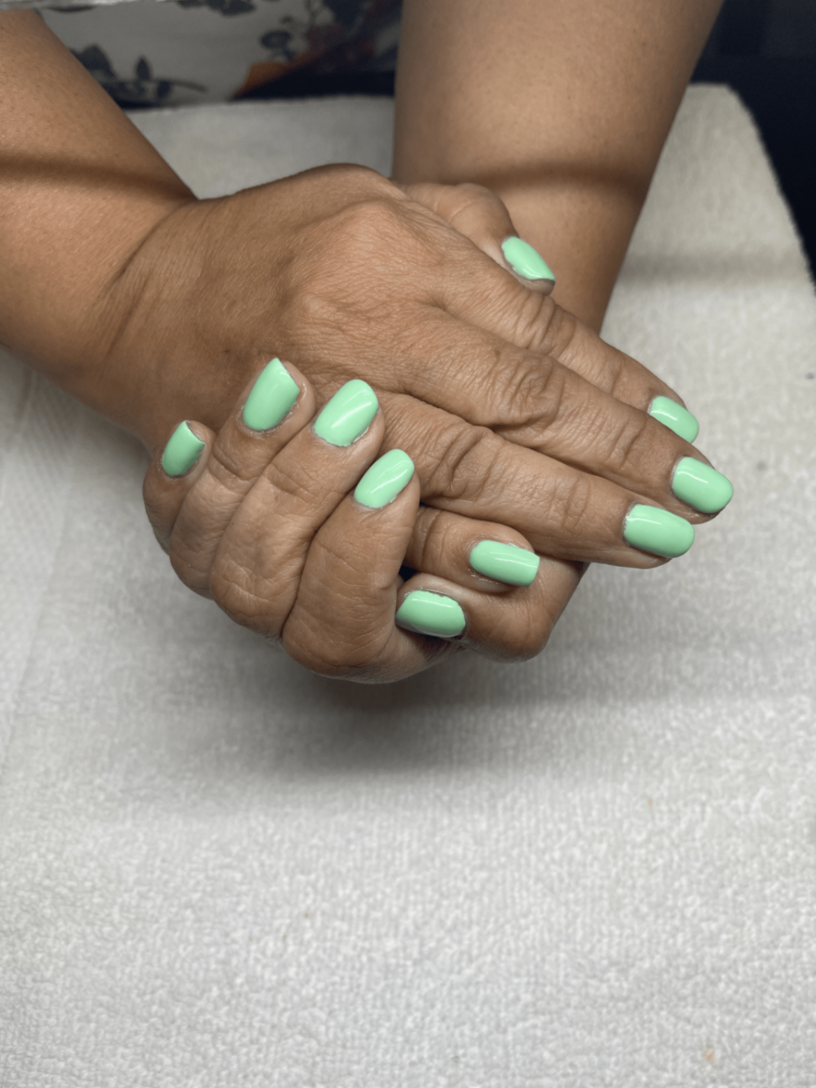 Mint green manicure by Giraldo Salon & Spa
